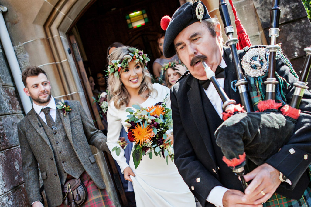 Bride is photographer who pays the piper Carli and Fraser on their wedding day