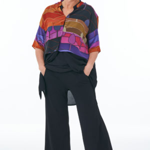 Black trousers bright silk crop tunic