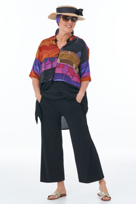 Black trousers bright silk crop tunic