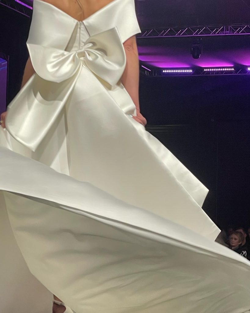 Swirling dress with bow