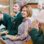 Mother of bride in her bespoke outfit at wedding