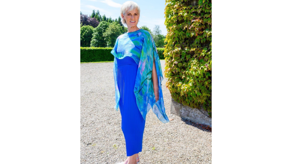 judy murray in wimbledon royal box wearing signature summer collection by Joyce Young