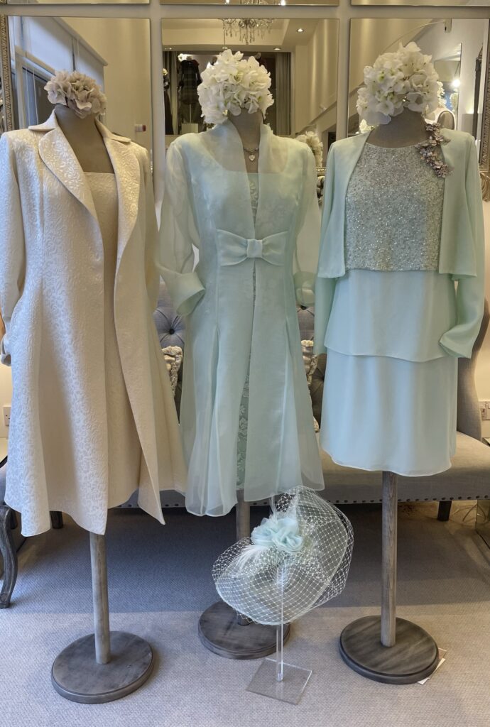 3 dress dummies wearing outfits suitable for mother of the bride or groom