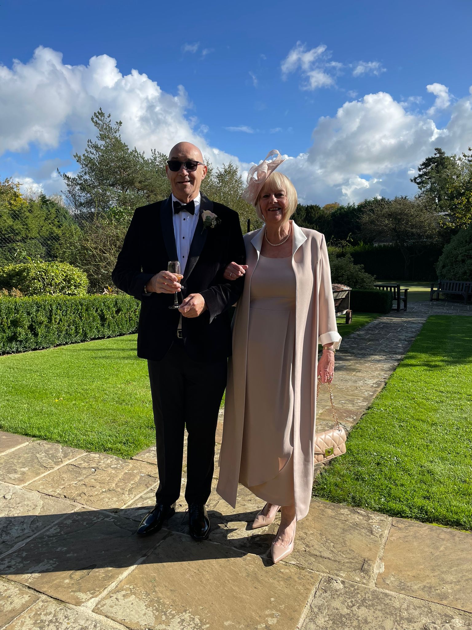 Mother of the groom in a beautiful joyce young dress and coat