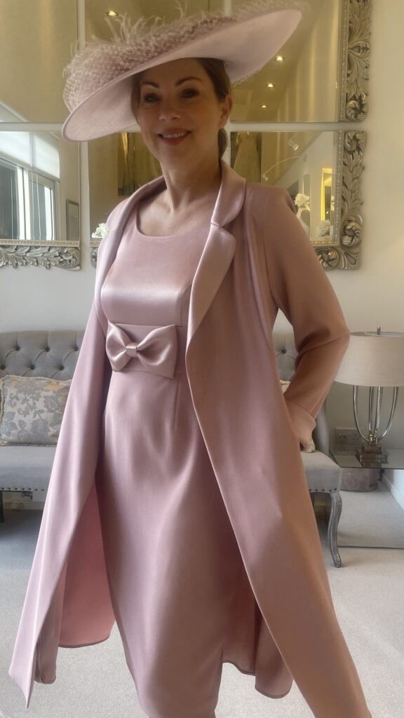 Dress and coat in dusky pink