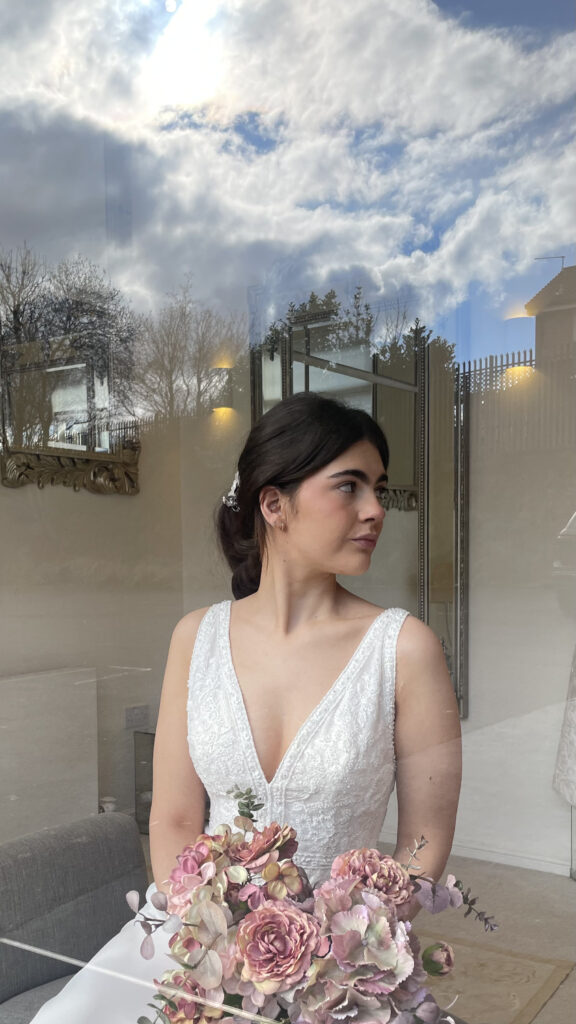 Young bride looks wistfully into the distance