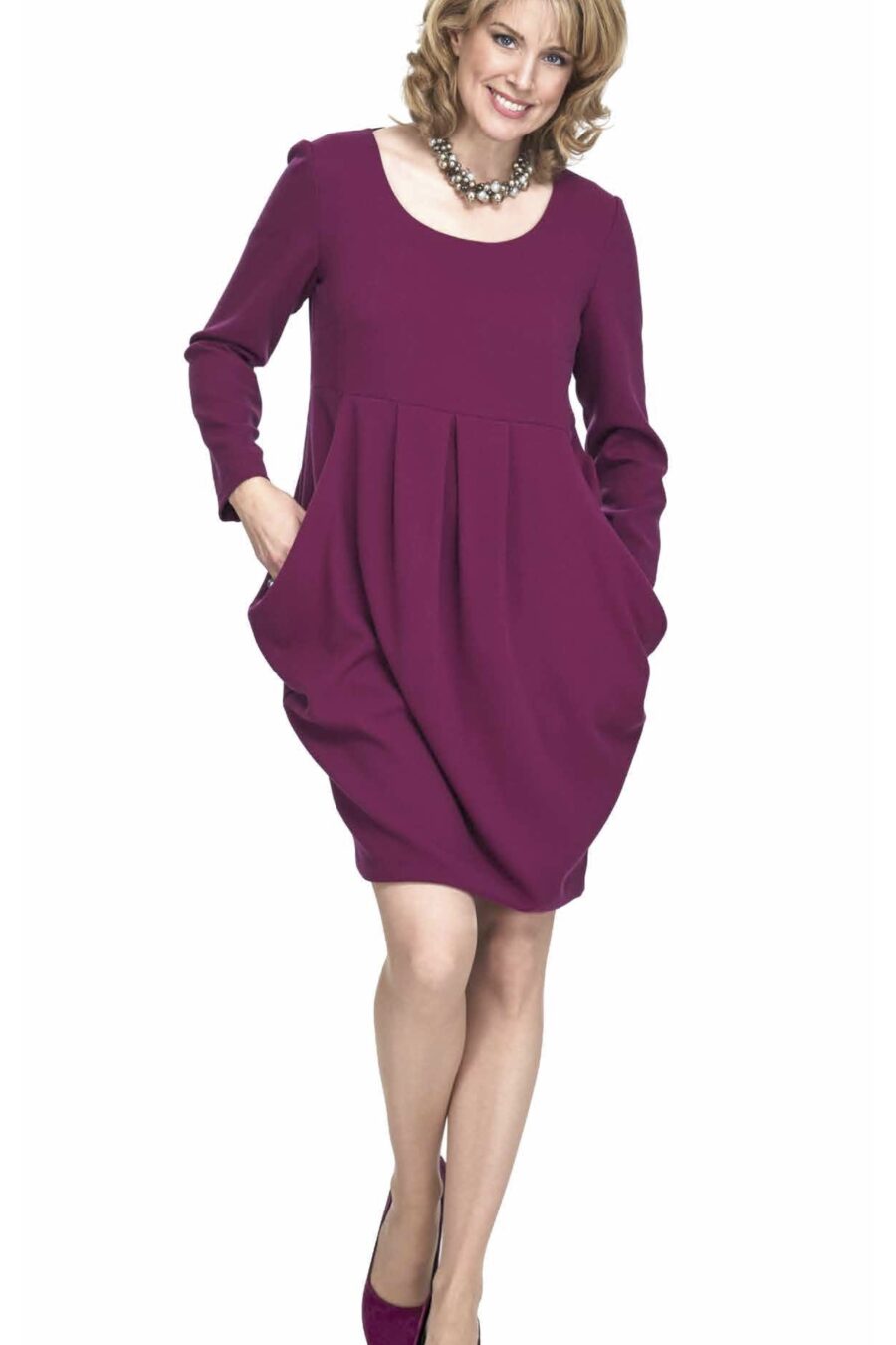 Model wearing tulip shape dress with deep pockets wd261b £99 from £450
